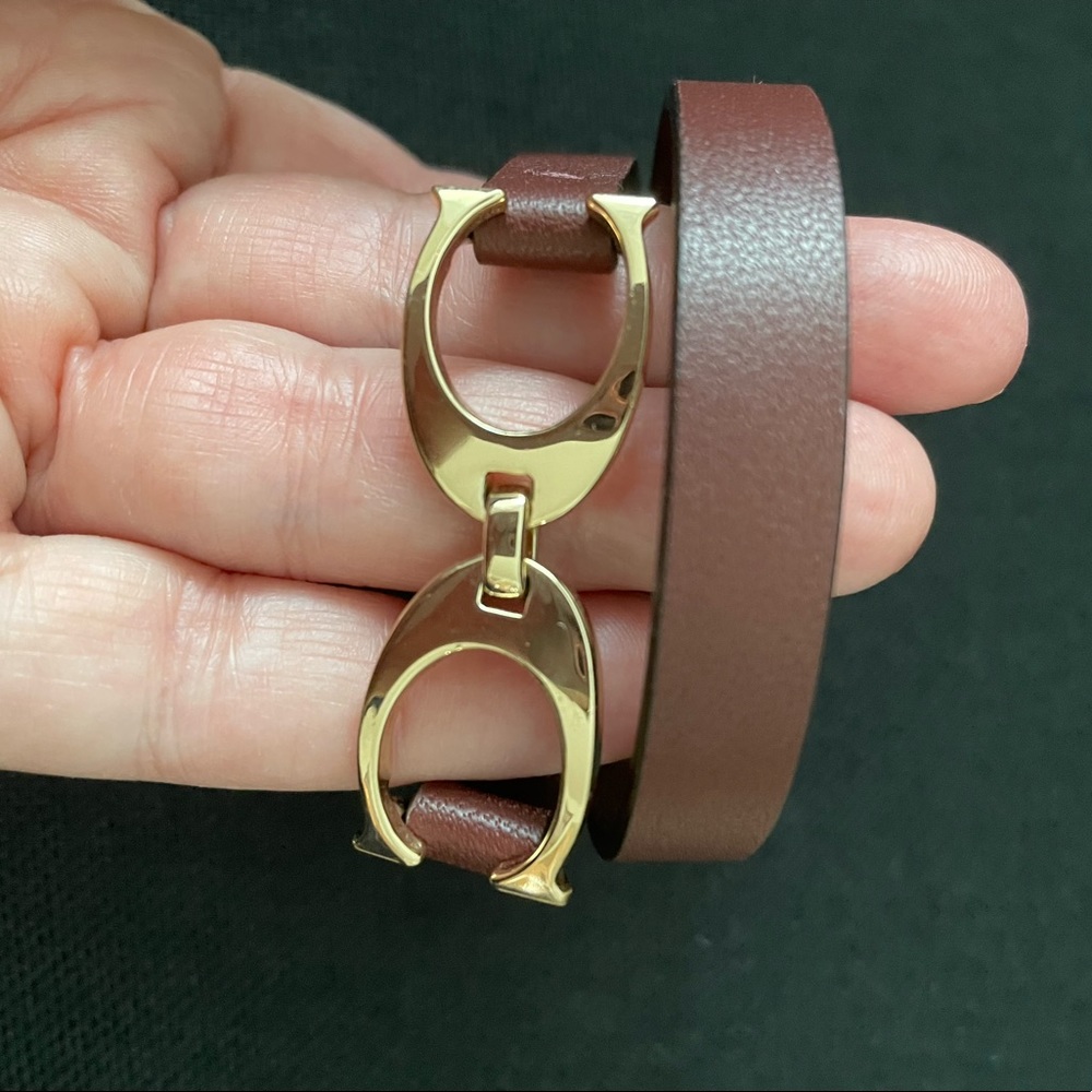 Beautiful NWOT Coach leather wrap around bracelet. Never worn was a gift.
